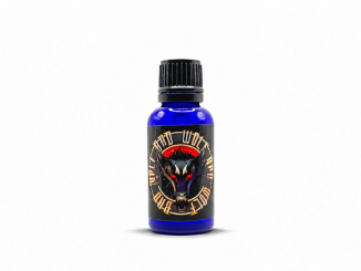 Liquid Alchemy Labs Bad Wolf pheromone cologne bottle on white.