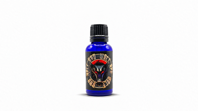 Liquid Alchemy Labs Bad Wolf pheromone cologne bottle on white.
