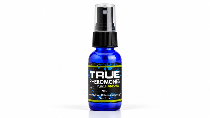 TRUE Charisma Two Shot men's pheromone spray in a cobalt-blue 30 mL glass bottle with black spray cap, transparent cover, and TRUE PHEROMONES label against a clean white studio background.