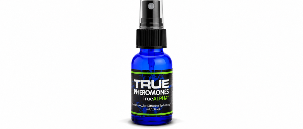 TRUE Alpha pheromone spray bottle for men, featuring cobalt-blue glass, a black spray cap, and a black label with green accents on a white background.