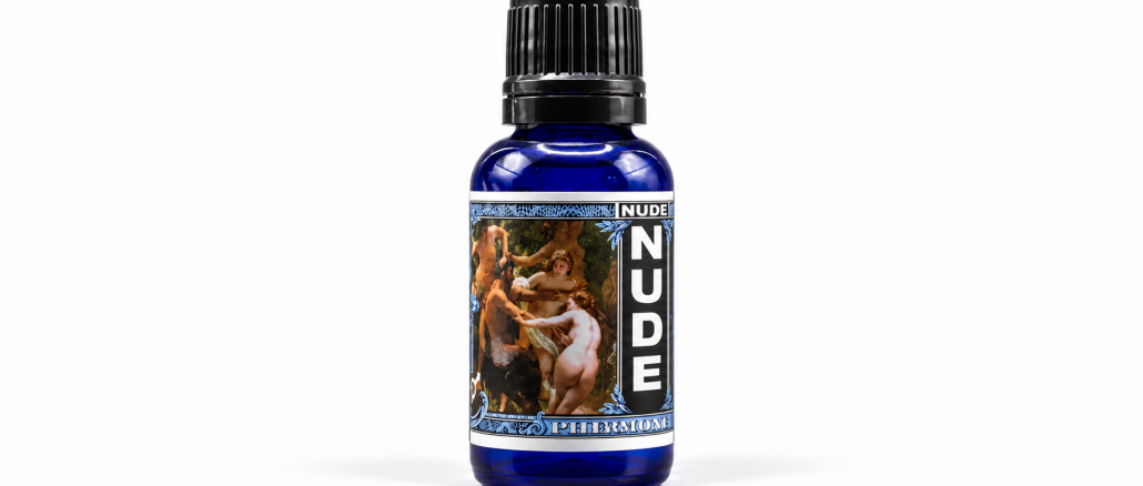 Liquid Alchemy Labs Nude Original men's pheromone oil in a cobalt-blue glass bottle with a black ribbed cap, classical artwork label, and vertical NUDE lettering against a clean white studio background.