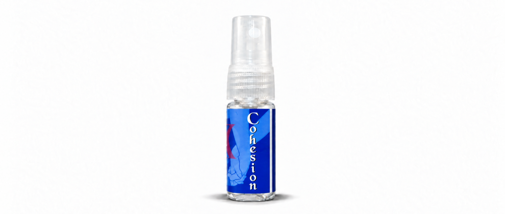 Cohesion XS pheromone spray bottle for men on a white background