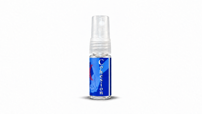 Cohesion XS pheromone spray bottle for men on a white background