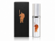 LaCroy IMPI Original men's pheromone cologne in a silver spray bottle with copper warrior emblem, displayed beside its black retail box against a white studio background.