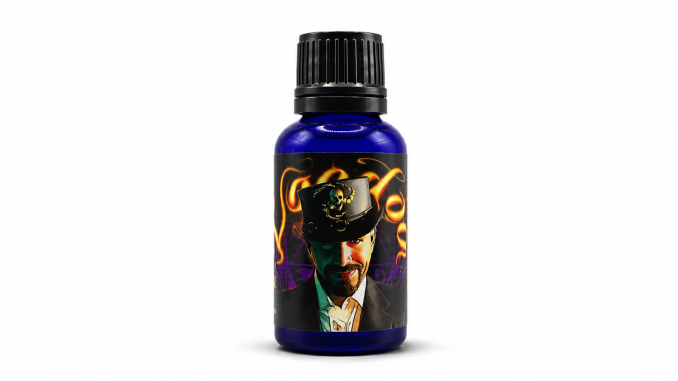 Liquid Alchemy Labs VooDoo pheromone cologne in a blue glass bottle with black cap and illustrated voodoo-themed label.