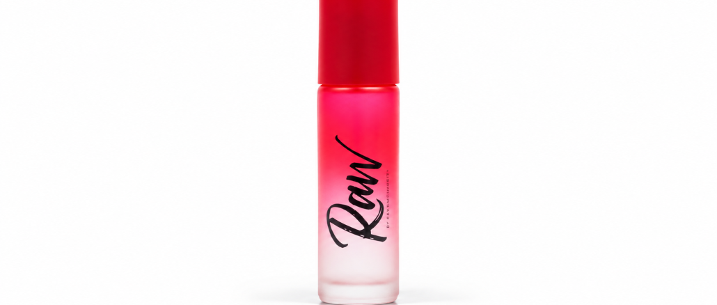 RawChemistry Raw Pheromone Roll-On cologne in a red-to-frosted-white gradient glass bottle with a bright red cap and black Raw script lettering, photographed against a clean white studio background.