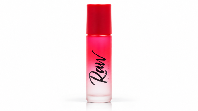 RawChemistry Raw Pheromone Roll-On cologne in a red-to-frosted-white gradient glass bottle with a bright red cap and black Raw script lettering, photographed against a clean white studio background.