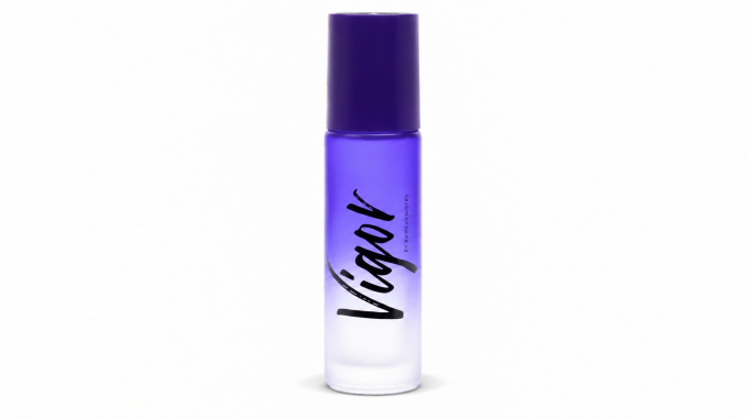 RawChemistry Vigor pheromone cologne roll-on for men in a purple gradient bottle with a dark-purple cap and black Vigor logo, photographed against a white background.