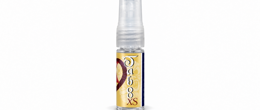 PheromoneXS Taboo XS pheromone spray for men in a clear 10 mL bottle with a transparent spray cap, gold decorative label, vertical Taboo lettering, and XS logo against a white background.