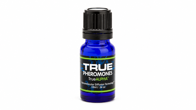 TRUE Alpha pheromone oil for men in a 10 mL cobalt-blue glass bottle with a black ribbed cap and black label featuring green accents.